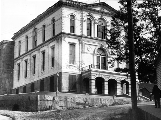 Completed 1864. The first courthouse on this site in Nevada City was built in 1856, damaged by fire the same year, and then rebuilt. When fire again damaged the courthouse in 1863, a new courthouse was built on the same site. The lobby of the building, which was extensively remodeled in the 1930s and given an Art Deco façade, houses a collection of photographs of the courthouse as well as other exhibits. It remains in use. Courtesy California State Library